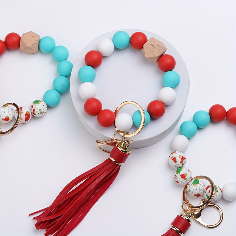 Colorful beaded keychains with tassels on a white background